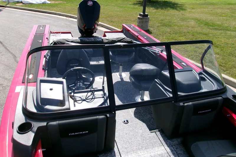 Slide: The Image of 2026 Tracker Targa V-19 Combo boat interior with seating and steering wheel. - 5
