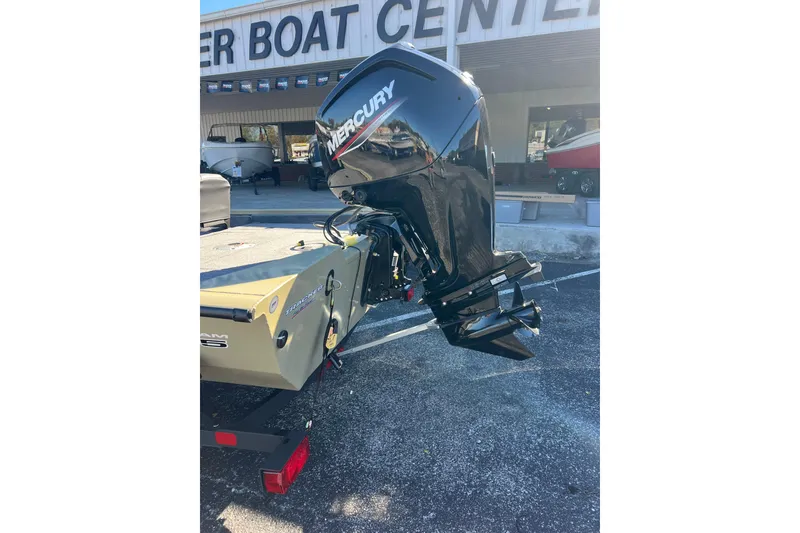 Slide: The Image of 2026 Tracker Pro Team 175 Crappie Edition boat with Mercury outboard motor at dealer. - 3