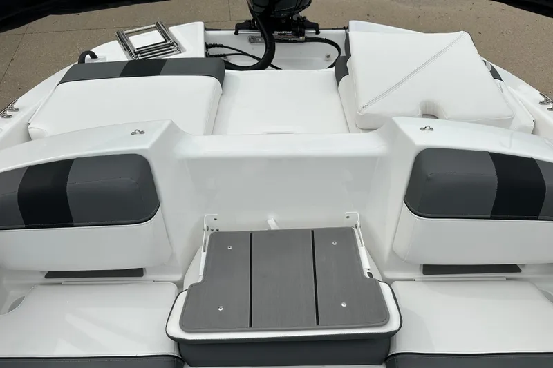 Slide: The Image of 2026 Tahoe T21 boat interior with cushioned seating and sleek design. - 13