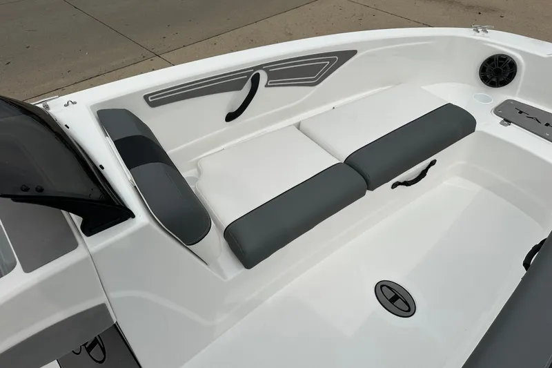 Slide: The Image of 2026 Tahoe T21 boat interior with gray and white seating, sleek design, and modern features. - 4