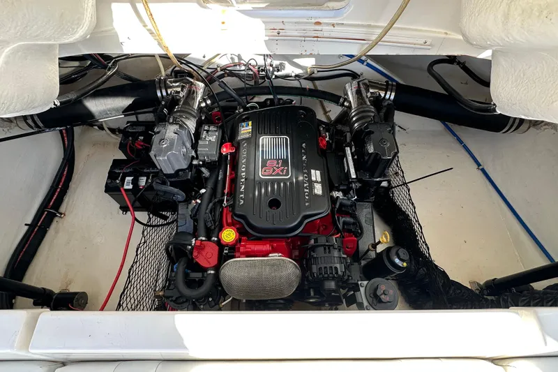 Slide: The Image of Engine compartment of a 2008 Larson LXi 288 boat, featuring a Volvo Penta 8.1 GXI engine. - 22