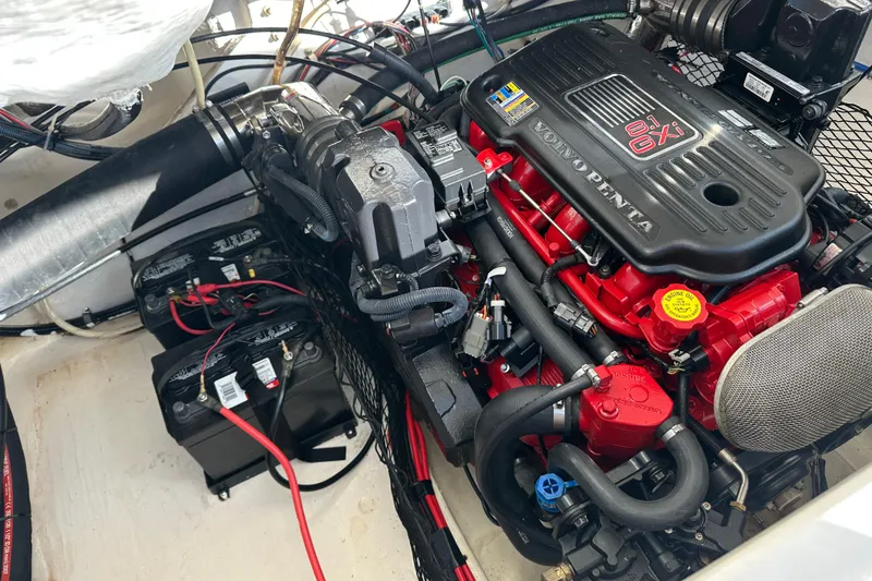 Slide: The Image of Engine compartment of a 2008 Larson LXi 288 boat with Volvo Penta engine. - 23