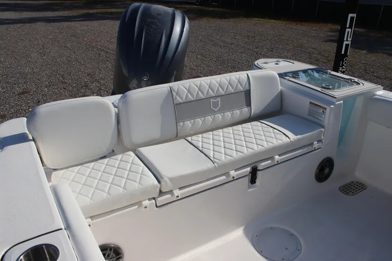 Slide: The Image of 2026 Sea Fox 248 Commander boat with white cushioned seating and sleek design. - 23