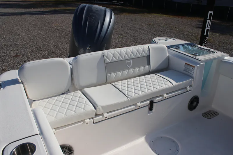 Slide: The Image of 2026 Sea Fox 248 Commander boat interior with cushioned seating and storage. - 24