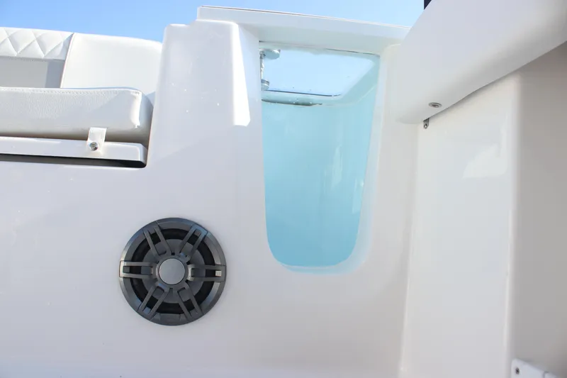 Slide: The Image of 2026 Sea Fox 248 Commander boat interior with speaker and seating detail. - 25