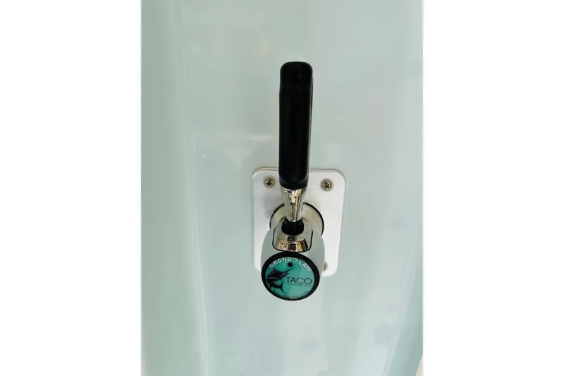 Slide: The Image of TACO Grand Slam handle on 2025 Sportsman Heritage 261 Center Console boat. - 17