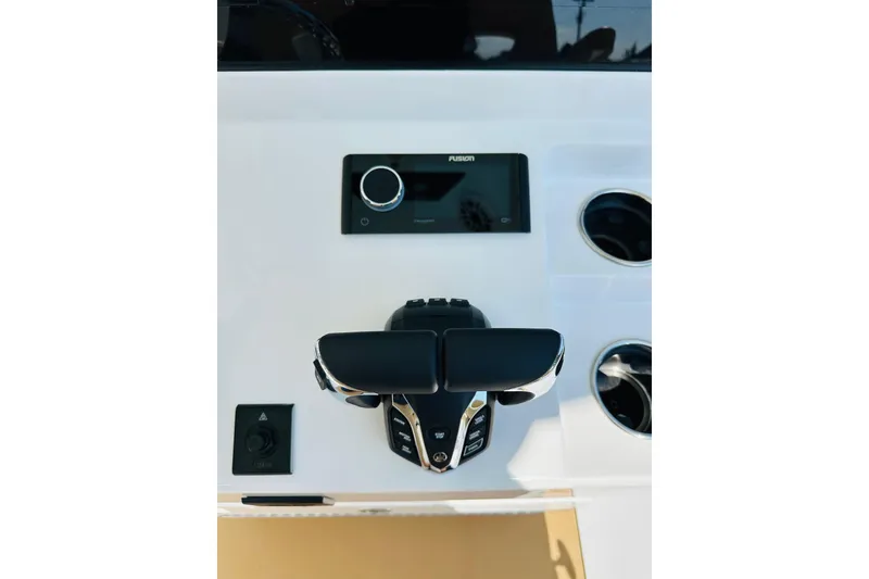 Slide: The Image of 2025 Sportsman Heritage 261 Center Console dashboard with controls and display. - 4