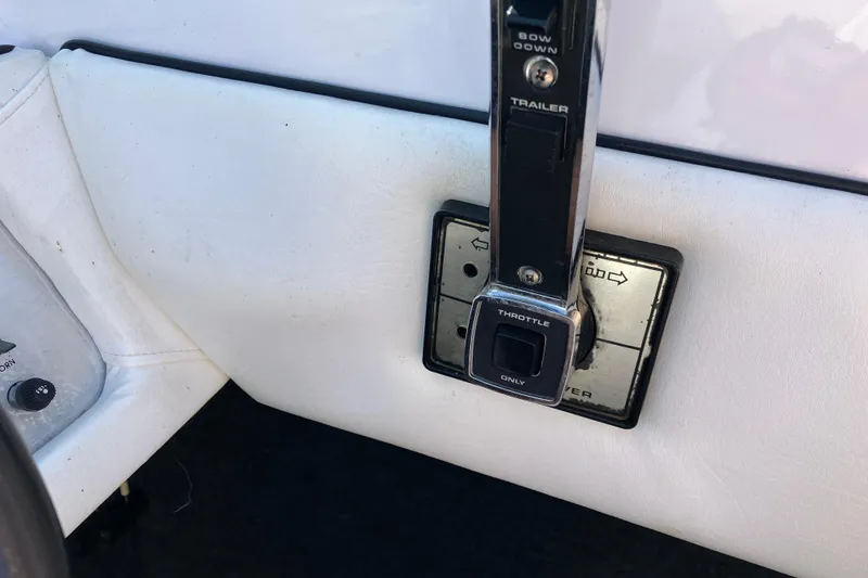 Slide: The Image of Throttle control lever on 1983 Chris-Craft 230 Scorpion boat dashboard. - 8