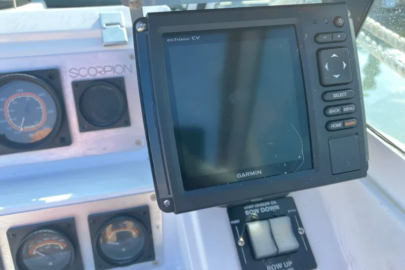 Slide: The Image of Garmin navigation system on 1983 Chris-Craft 230 Scorpion boat dashboard. - 7