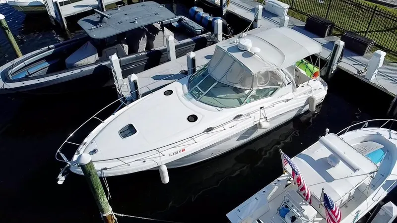 The Image of 2006 Sea Ray 340 Sundancer docked at marina, aerial view. - 0