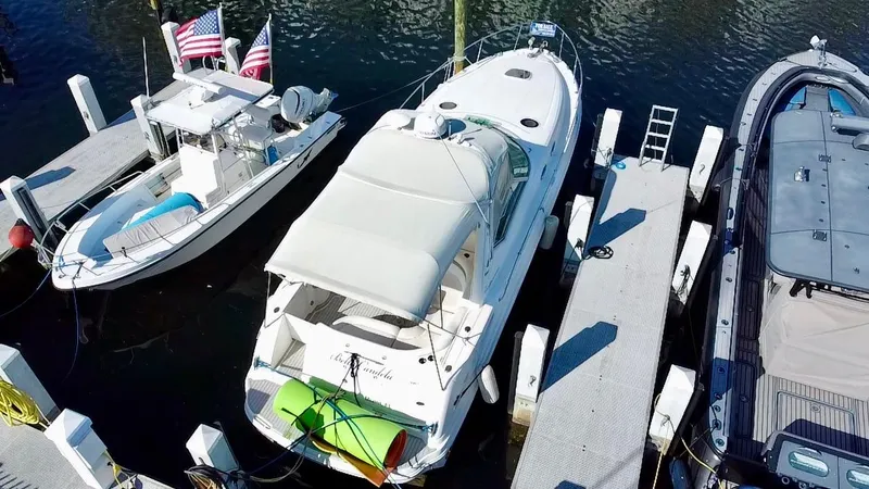 Slide: The Image of 2006 Sea Ray 340 Sundancer docked at marina, aerial view. - 10