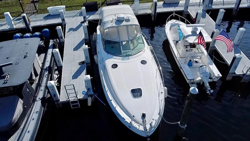 Slide: The Image of 2006 Sea Ray 340 Sundancer docked at marina, aerial view. - 15