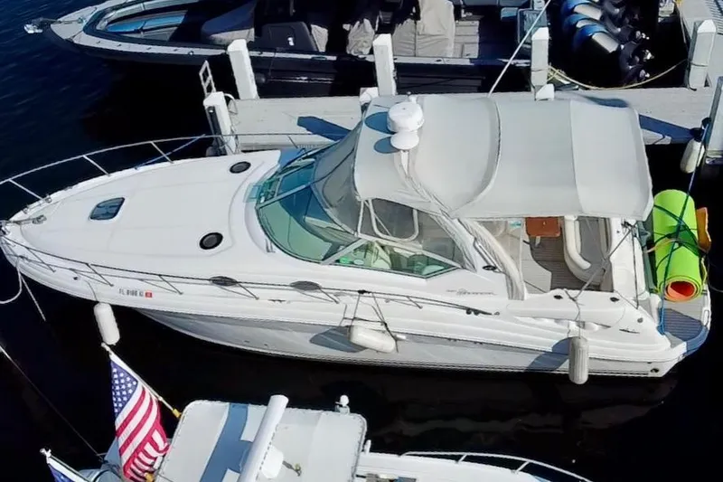 Slide: The Image of 2006 Sea Ray 340 Sundancer docked at marina, aerial view. - 4