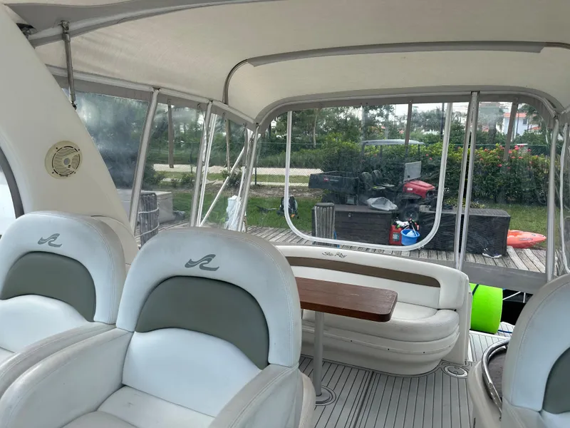 Slide: The Image of Interior of a 2006 Sea Ray 340 Sundancer boat with seating and table. - 40