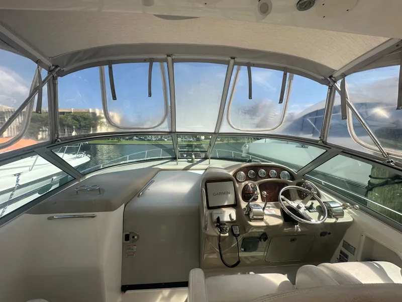 Slide: The Image of 2006 Sea Ray 340 Sundancer helm with Garmin navigation system. - 42