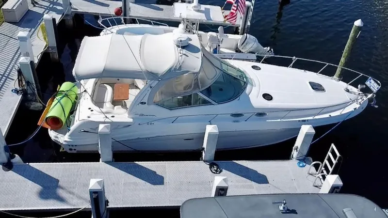 Slide: The Image of 2006 Sea Ray 340 Sundancer docked at marina, aerial view. - 7