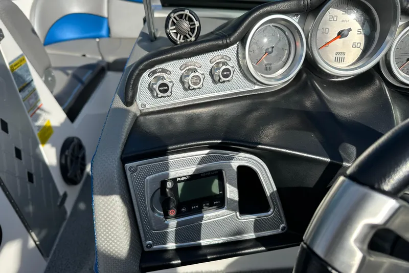 Slide: The Image of Dashboard of 2016 MasterCraft X23 boat with gauges and control panel. - 15