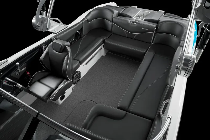 Slide: The Image of Manufacturer Provided Image: 2016 MasterCraft X23 boat interior with black leather seating and modern design. - 32