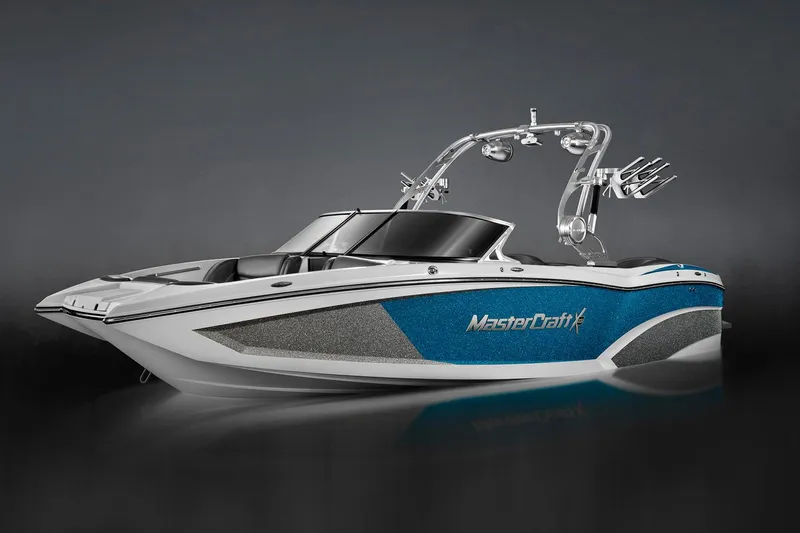 Slide: The Image of Manufacturer Provided Image: 2016 MasterCraft X23 boat with blue and white design. - 34