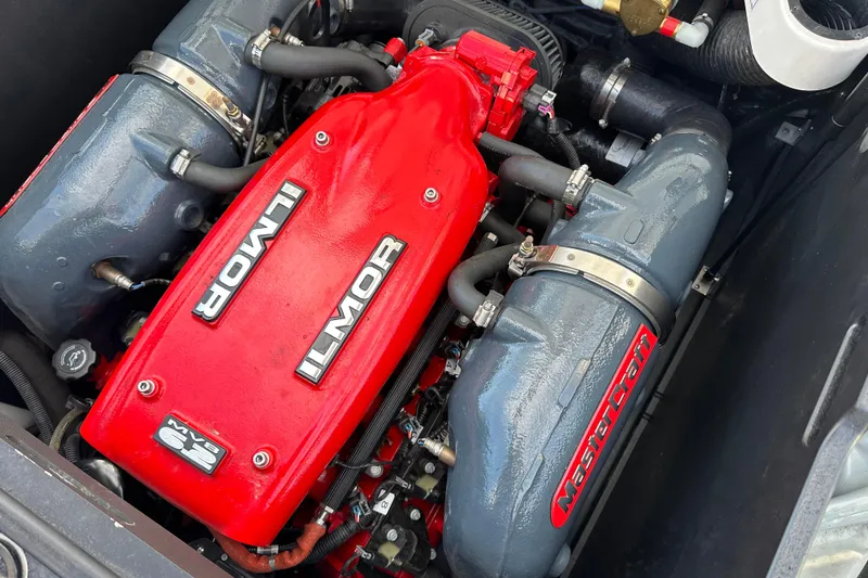 Slide: The Image of 2016 MasterCraft X23 engine with red Ilmor cover and MasterCraft branding. - 37