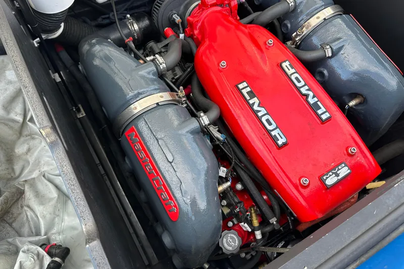 Slide: The Image of 2016 MasterCraft X23 engine with red Ilmor cover and MasterCraft branding. - 38