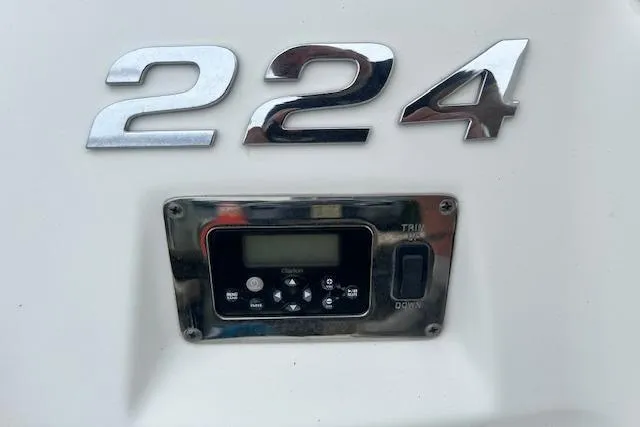 Slide: The Image of Chaparral 224 Sunesta 2011 boat control panel with trim adjustment. - 19