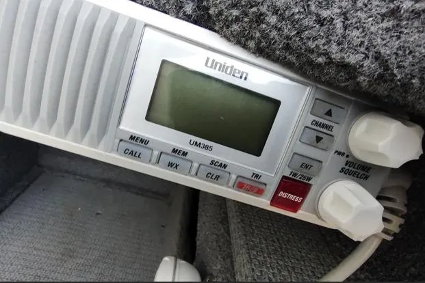 Slide: The Image of Uniden UM385 radio in a 2022 G3 Angler V164 F boat, featuring distress button. - 10