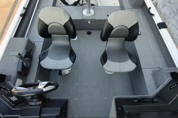 Slide: The Image of 2022 G3 Angler V164 F boat interior with two seats and steering wheel. - 8