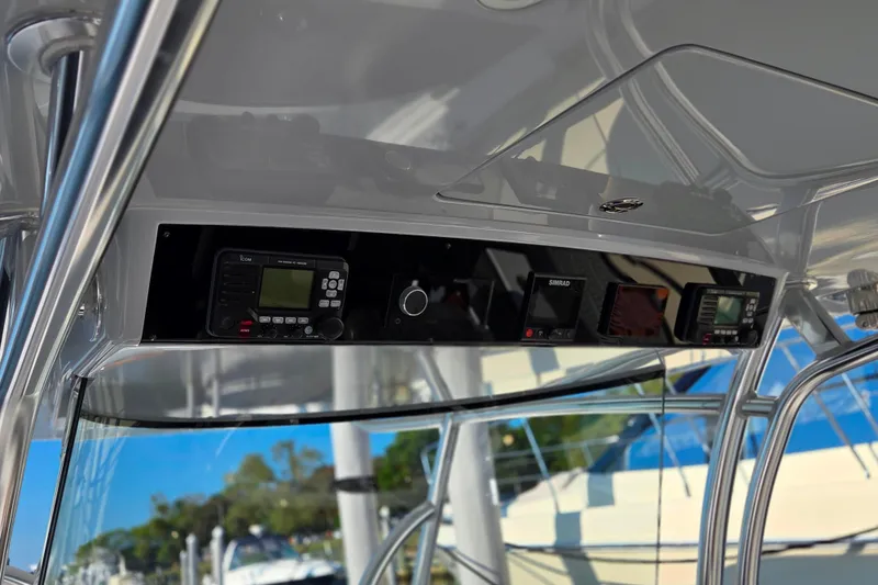 Slide: The Image of 2021 Valhalla Boatworks V-41 helm with advanced navigation displays and controls. - 15