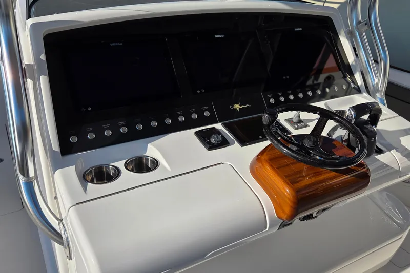 Slide: The Image of 2021 Valhalla Boatworks V-41 helm with modern controls and sleek design. - 16
