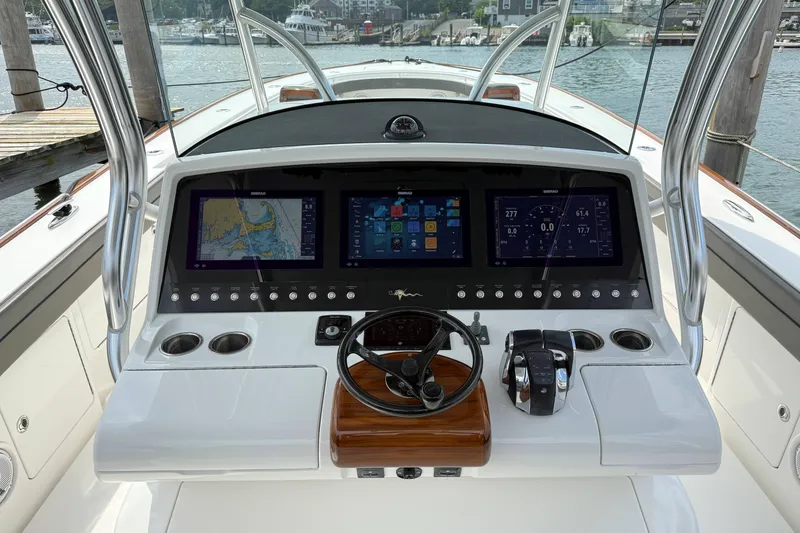 Slide: The Image of 2021 Valhalla Boatworks V-41 helm with advanced navigation displays and controls. - 17