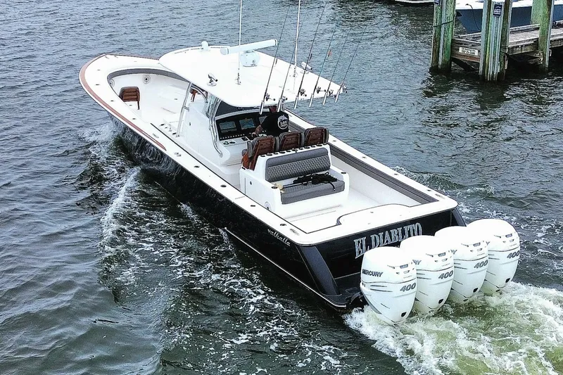 Slide: The Image of 2021 Valhalla Boatworks V-41 with four Mercury 400 engines cruising on water. - 28