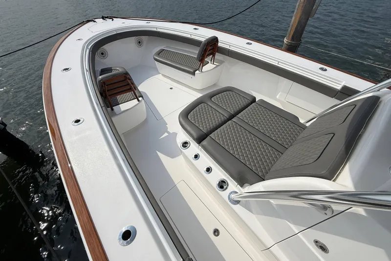 Slide: The Image of 2021 Valhalla Boatworks V-41 interior with cushioned seating and sleek design. - 8