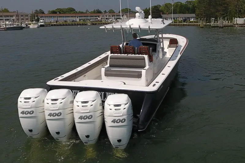 Slide: The Image of 2021 Valhalla Boatworks V-41 with four powerful outboard engines on the water. - 6