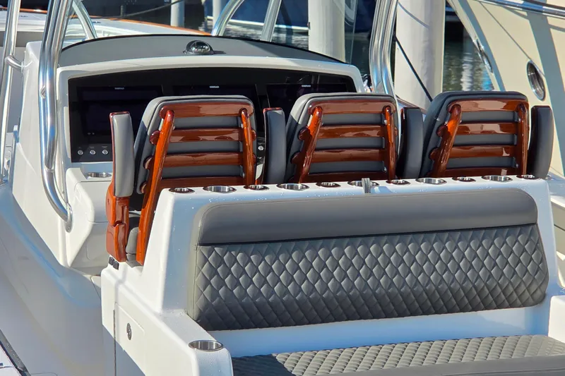Slide: The Image of 2021 Valhalla Boatworks V-41 interior with luxurious seating and modern dashboard. - 12
