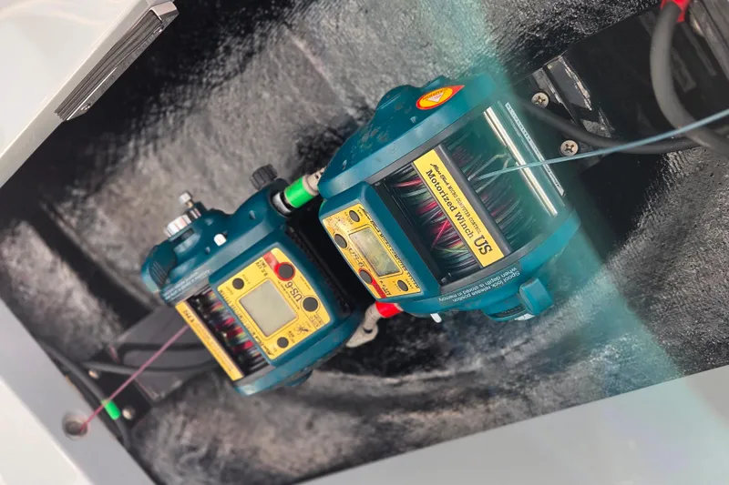Slide: The Image of Electric fishing reels on a 2021 Valhalla Boatworks V-41, showcasing advanced marine technology. - 21