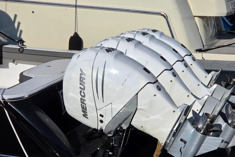Slide: The Image of Four Mercury outboard engines on a 2021 Valhalla Boatworks V-41. - 13
