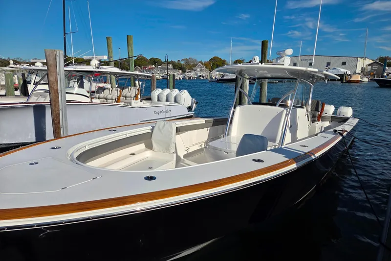 Slide: The Image of 2021 Valhalla Boatworks V-41 docked at marina under clear blue sky. - 5