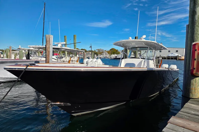 Slide: The Image of 2021 Valhalla Boatworks V-41 docked at marina under clear blue sky. - 3
