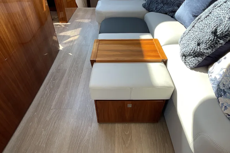 Slide: The Image of Luxurious interior of 2025 Riviera 585 SUV with elegant wood and plush seating. - 27