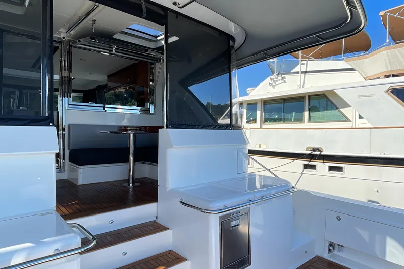 Slide: The Image of 2025 Riviera 585 SUV yacht interior with sleek design and modern amenities. - 4