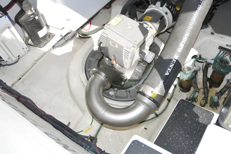 Slide: The Image of Stainless steel appliances on 2013 Regal 42 Sport Coupe yacht with teak flooring. - 15