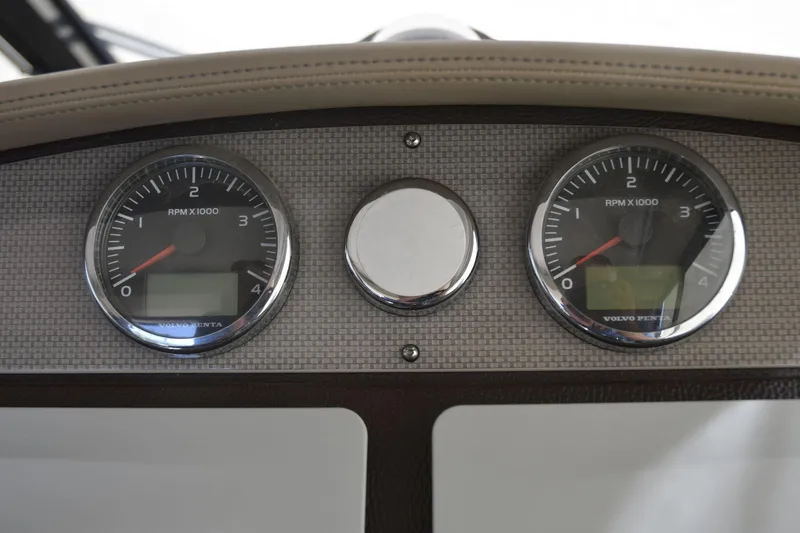 Slide: The Image of Dashboard of 2013 Regal 42 Sport Coupe with dual RPM gauges. - 23