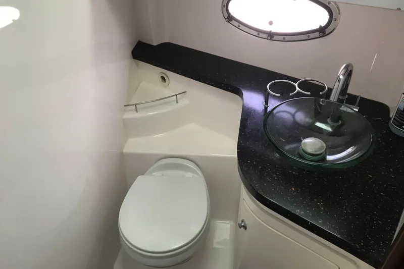 Slide: The Image of Bathroom interior of 2013 Regal 42 Sport Coupe yacht with modern fixtures. - 34