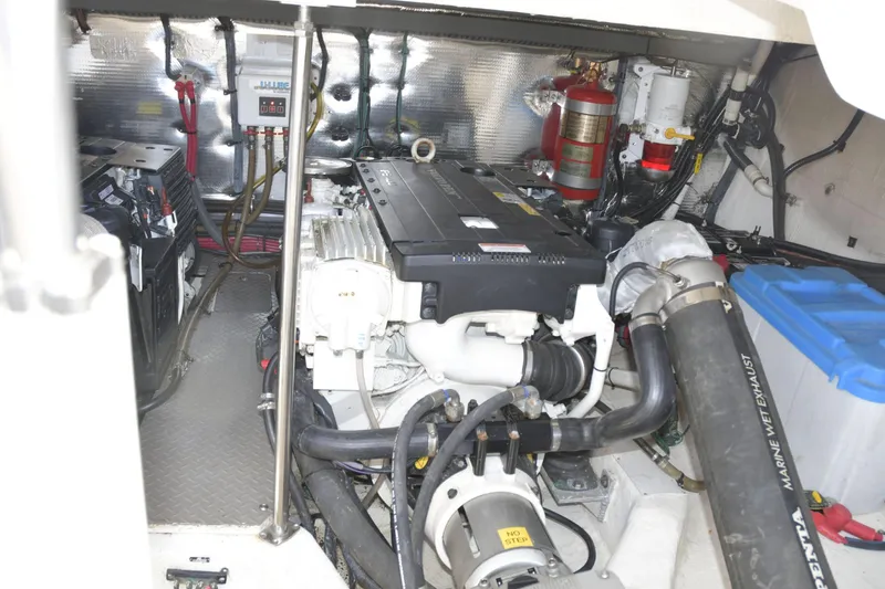Slide: The Image of Engine room of 2013 Regal 42 Sport Coupe with visible components and wiring. - 41