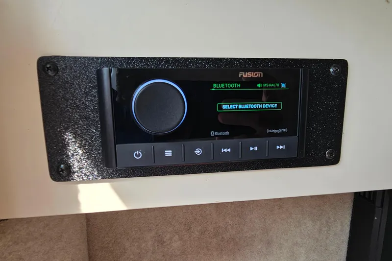 Slide: The Image of Fusion Bluetooth stereo system in a 2011 Formula 290 Bowrider boat. - 23