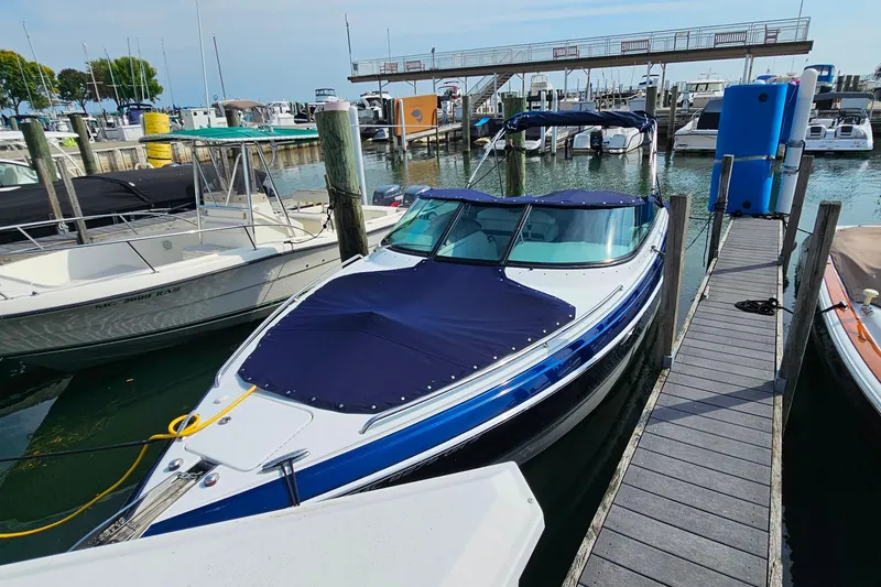 Slide: The Image of 2011 Formula 290 Bowrider docked at marina, covered and ready for use. - 6