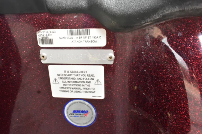 Slide: The Image of Close-up of Nitro Z18 2022 boat warning labels and certification sticker. - 12