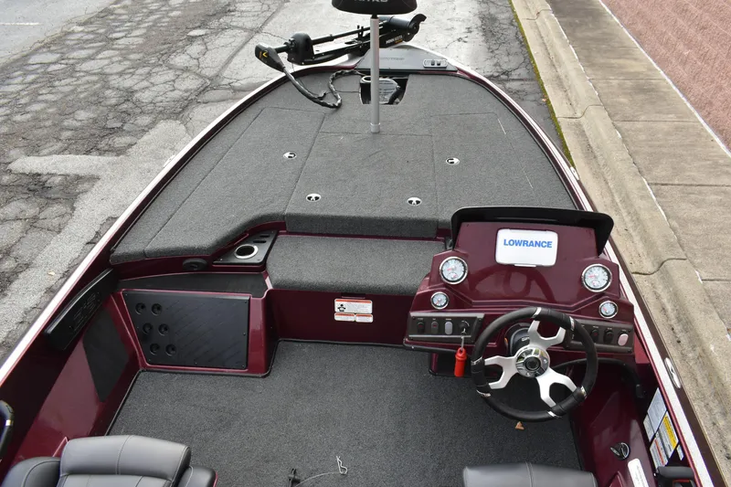 Slide: The Image of 2022 Nitro Z18 boat interior with steering wheel and Lowrance display. - 8