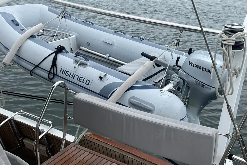 Slide: The Image of Highfield inflatable boat with Honda motor on 2017 Beneteau Sense 57 yacht. - 104